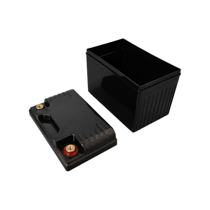 YT4X Empty battery box open for motorcycle starter battery.png